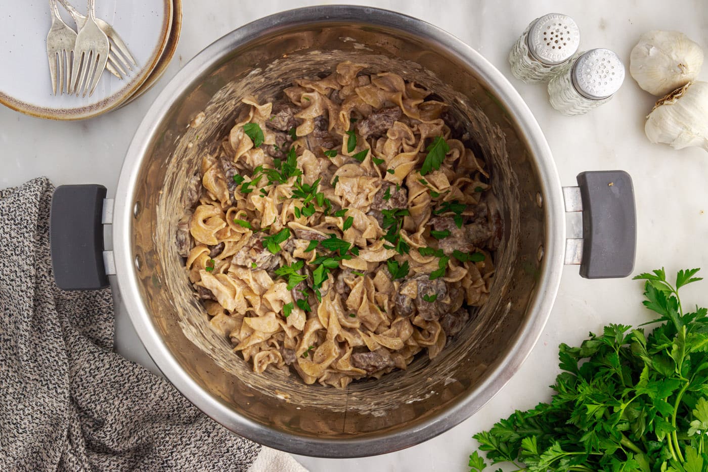 chopped parsley over instant pot beef stroganoff