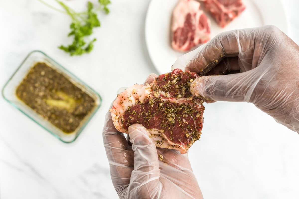 rubbing lamb chops with wet rub