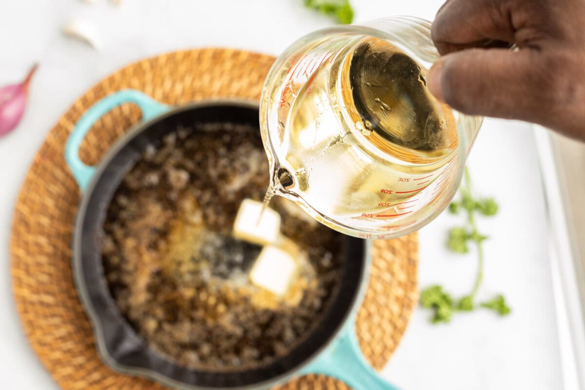 white wine reduction in a skillet