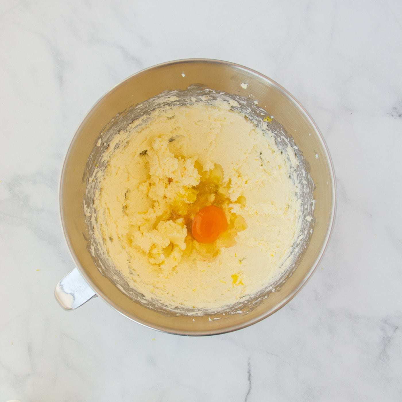 lemon juice, egg, and lemon zest added to cream cheese mixture