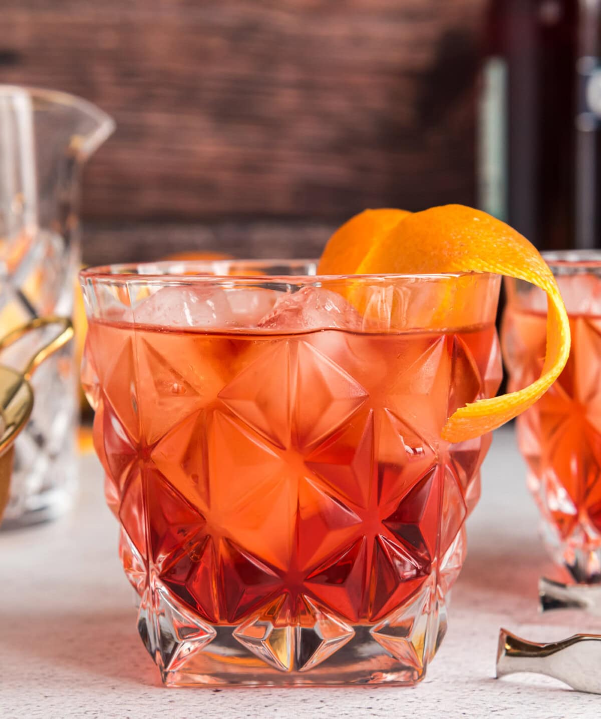 Negroni in a rock glass with orange garnish