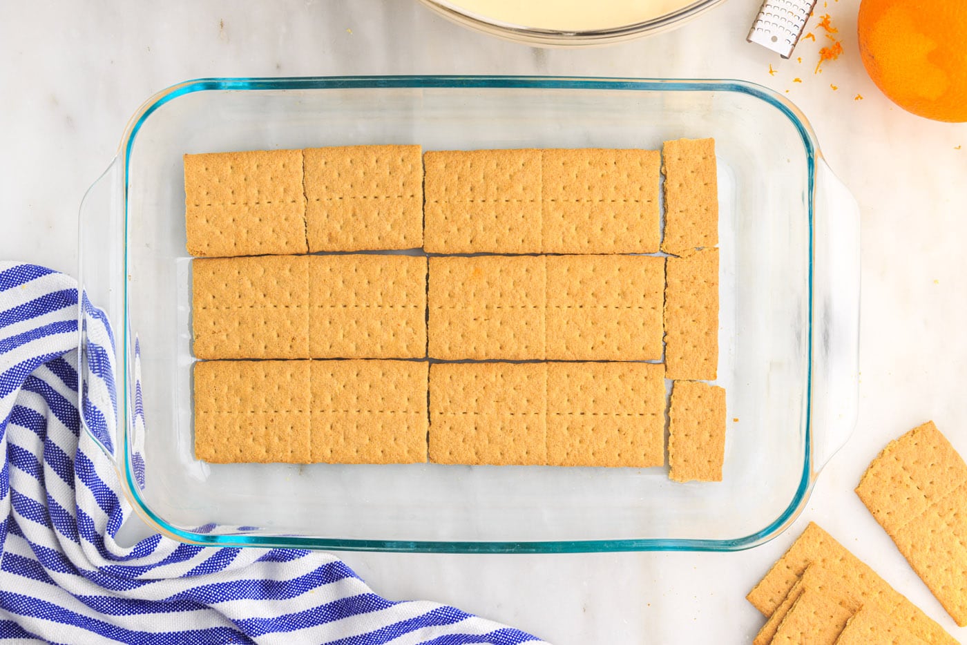 graham crackers on bottom of a baking dish