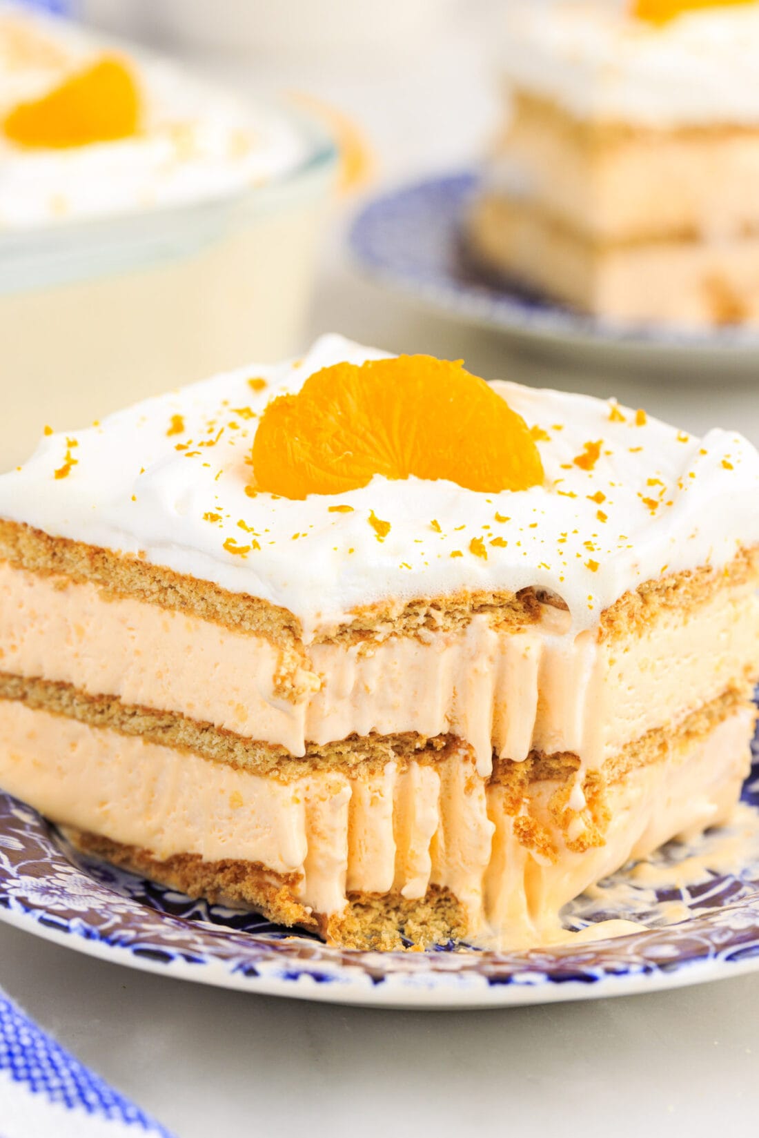 slice of Orange Icebox Cake with bite out of it