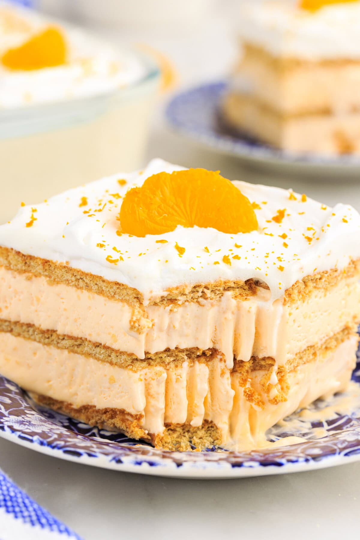 slice of Orange Icebox Cake with bite out of it