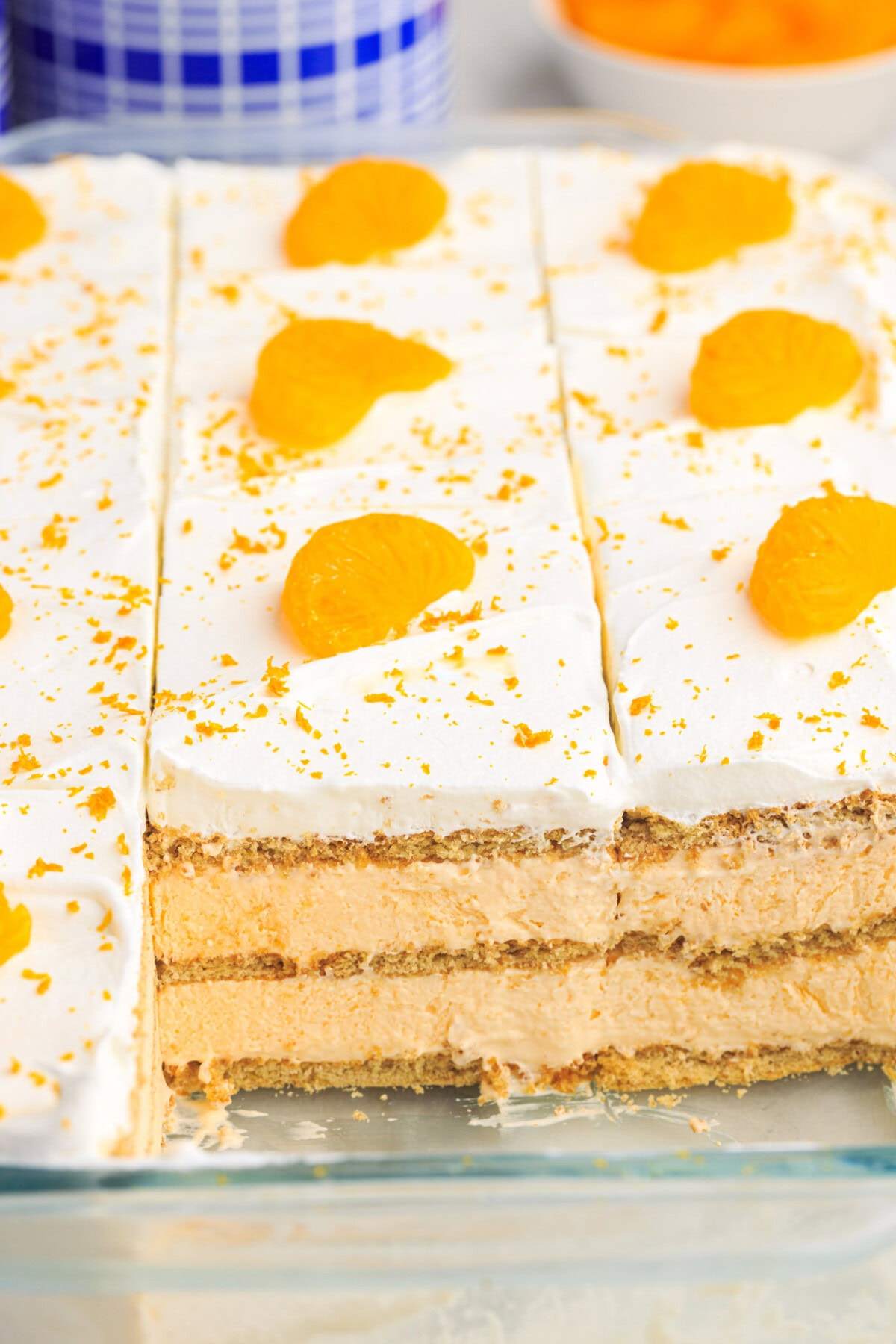 pan of Orange Icebox Cake cut into pieces