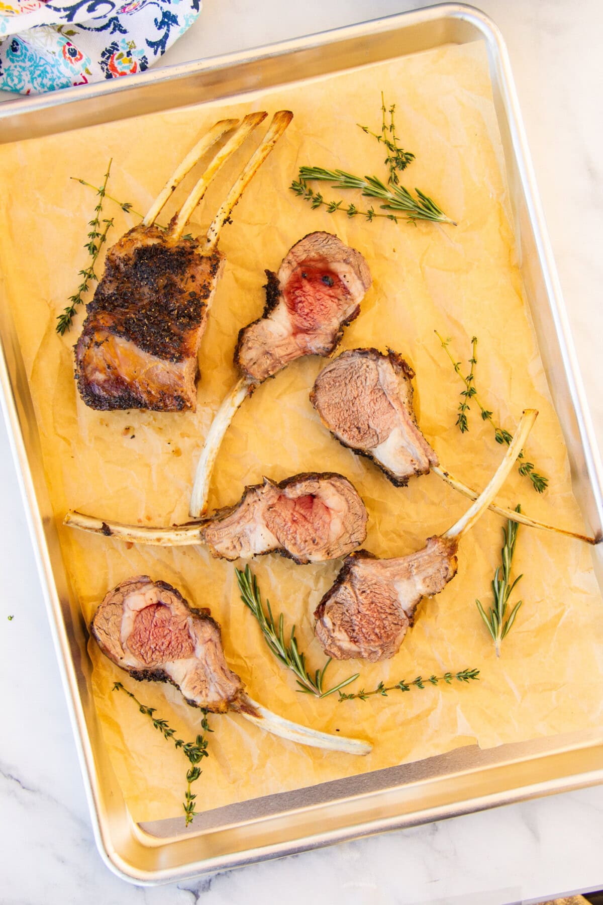 lamb chops on a baking sheet