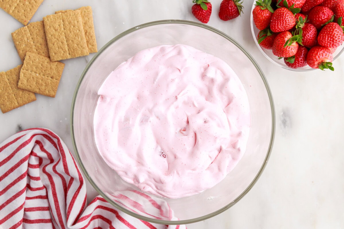 whipped strawberry jello layer in trifle bowl