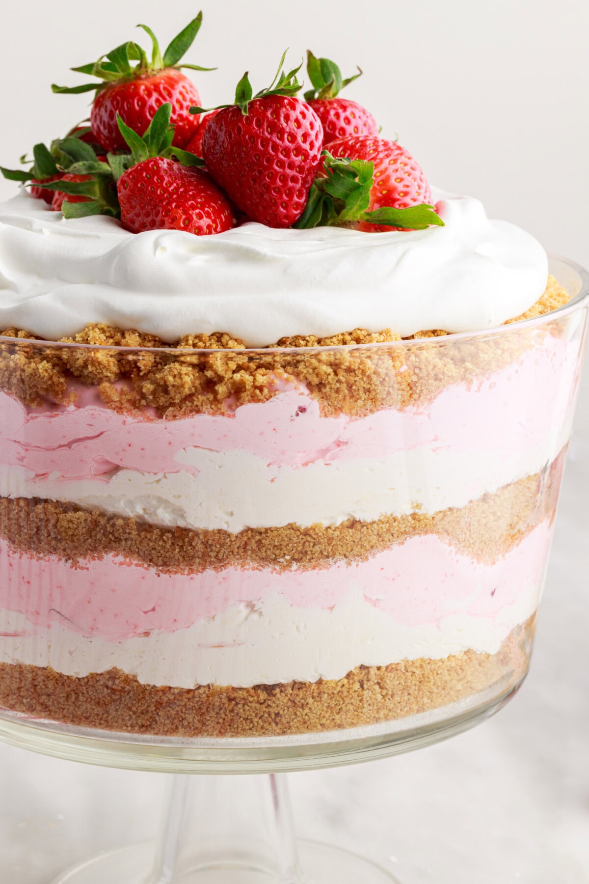Strawberry Lasagna Trifle with fresh strawberries on top