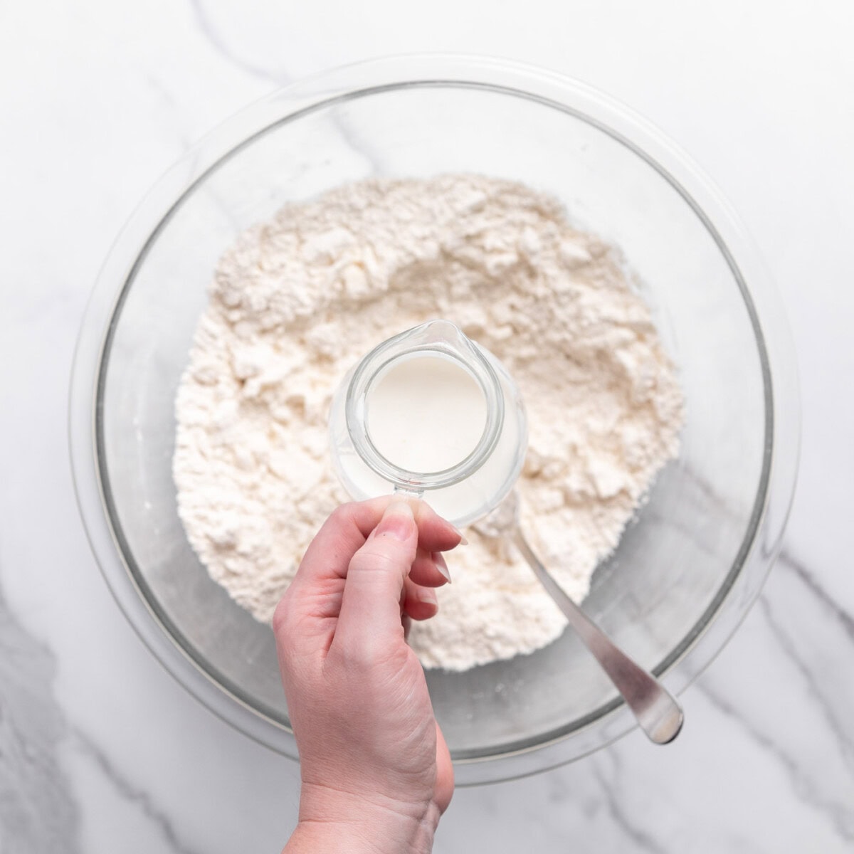 adding buttermilk to biscuit dry ingredients