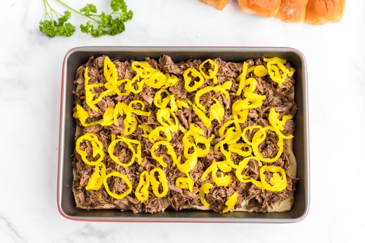 sliced pepperoncini over mississippi pot roast sliders