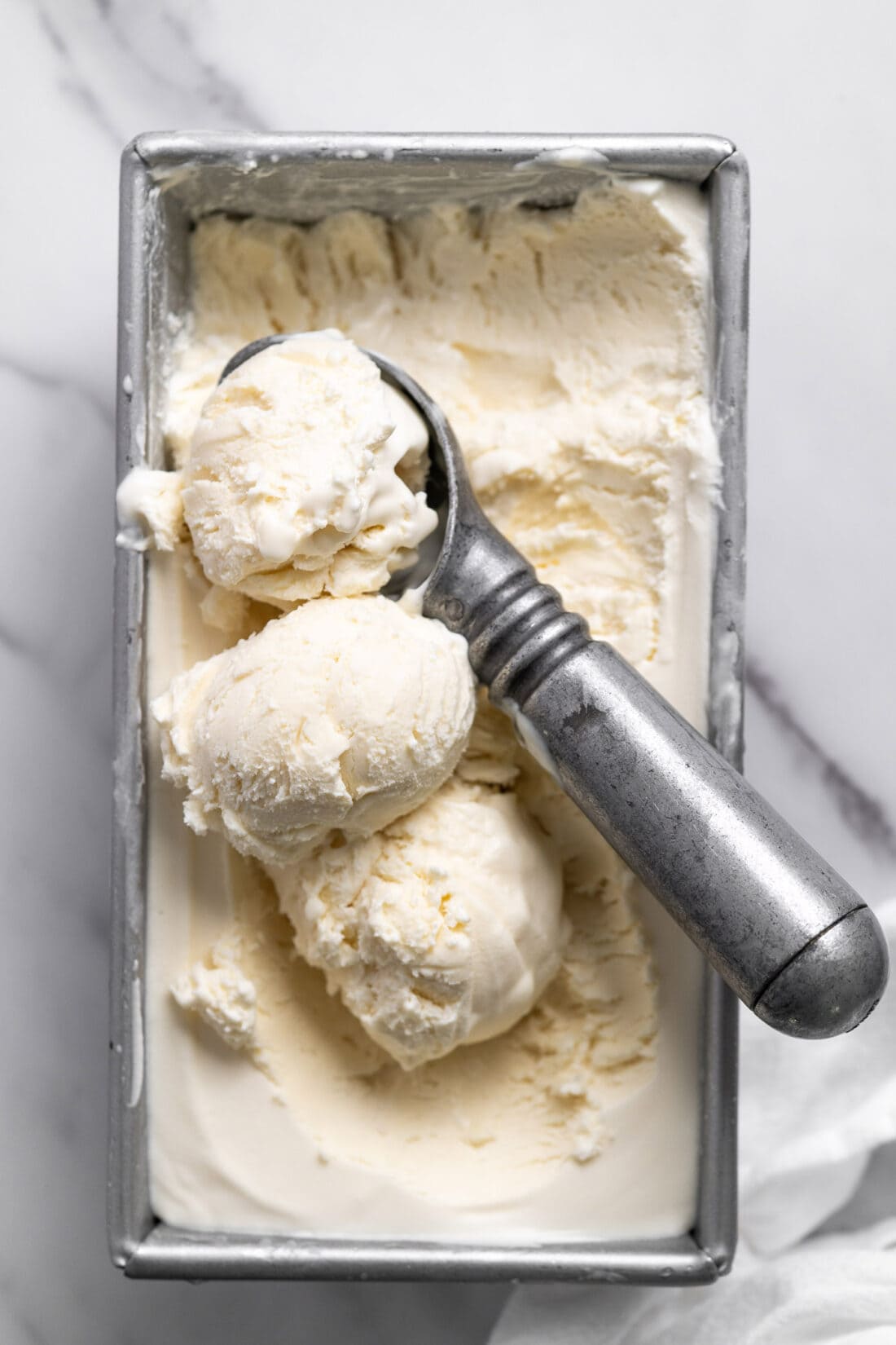 3 scoops of No Churn Ice Cream in a pan