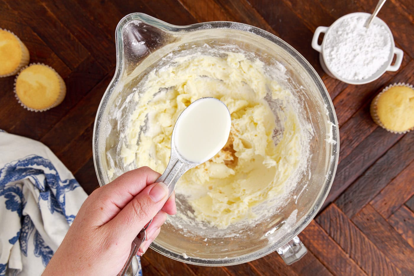adding heavy cream to buttercream frosting