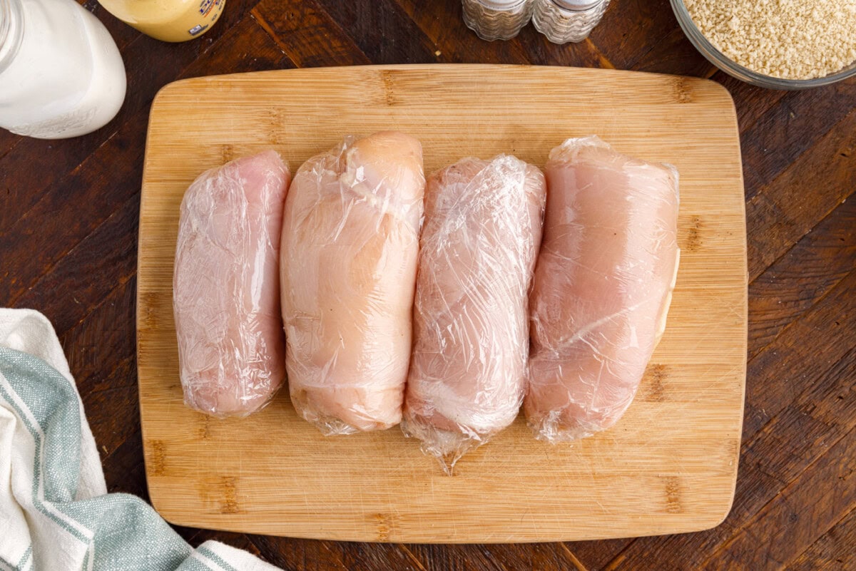 rolled chicken breast on a cutting board