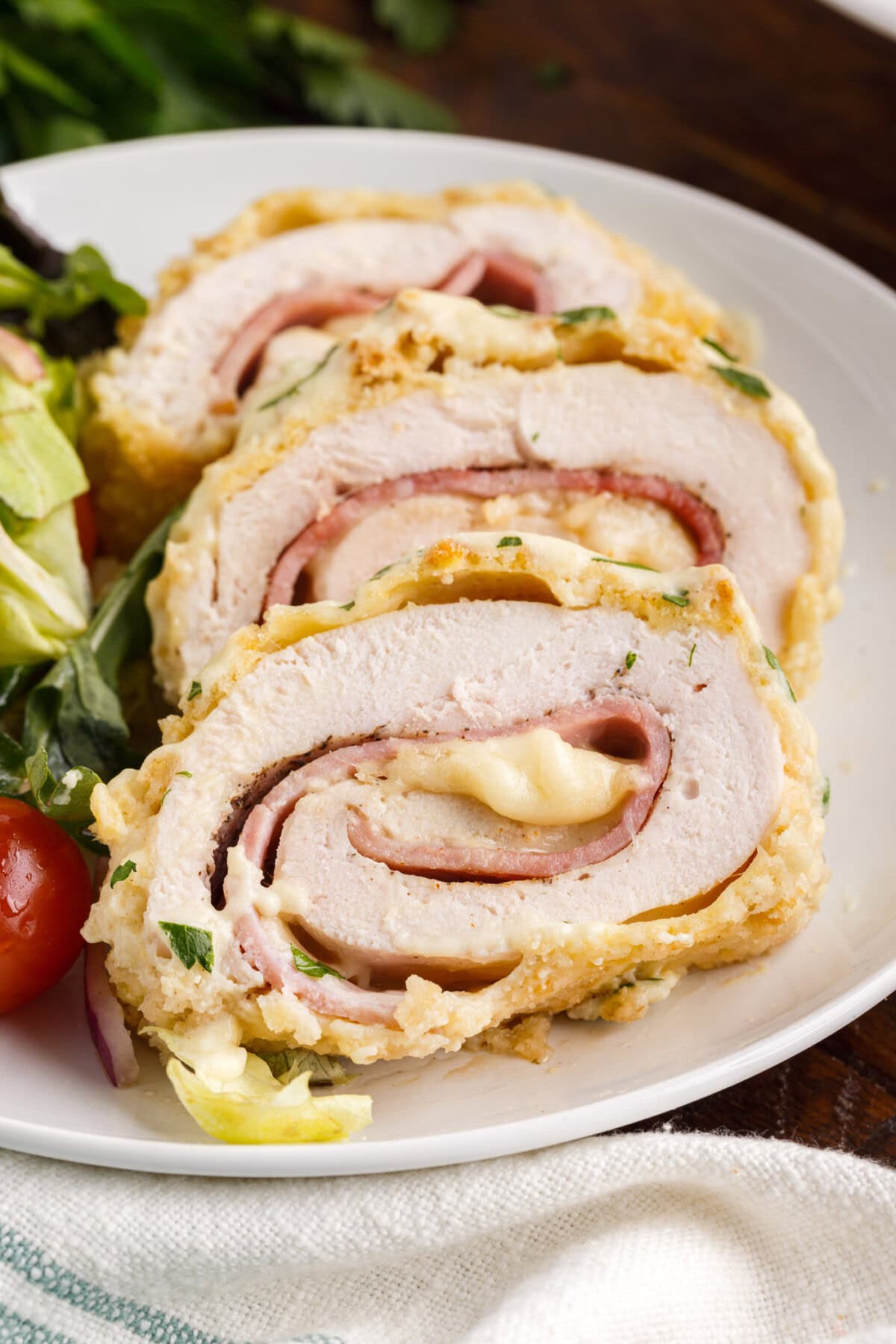 slices of Chicken Cordon Bleu on platter