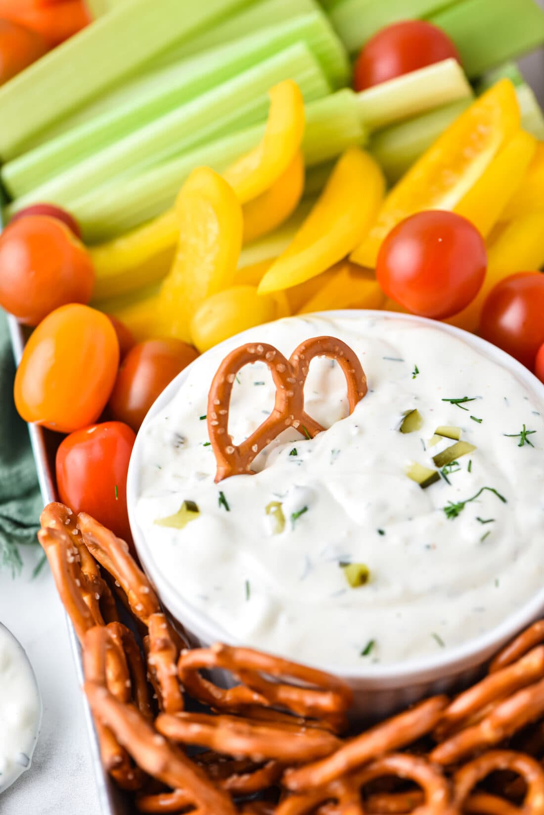 Dill Pickle Dip with a pretzel in it