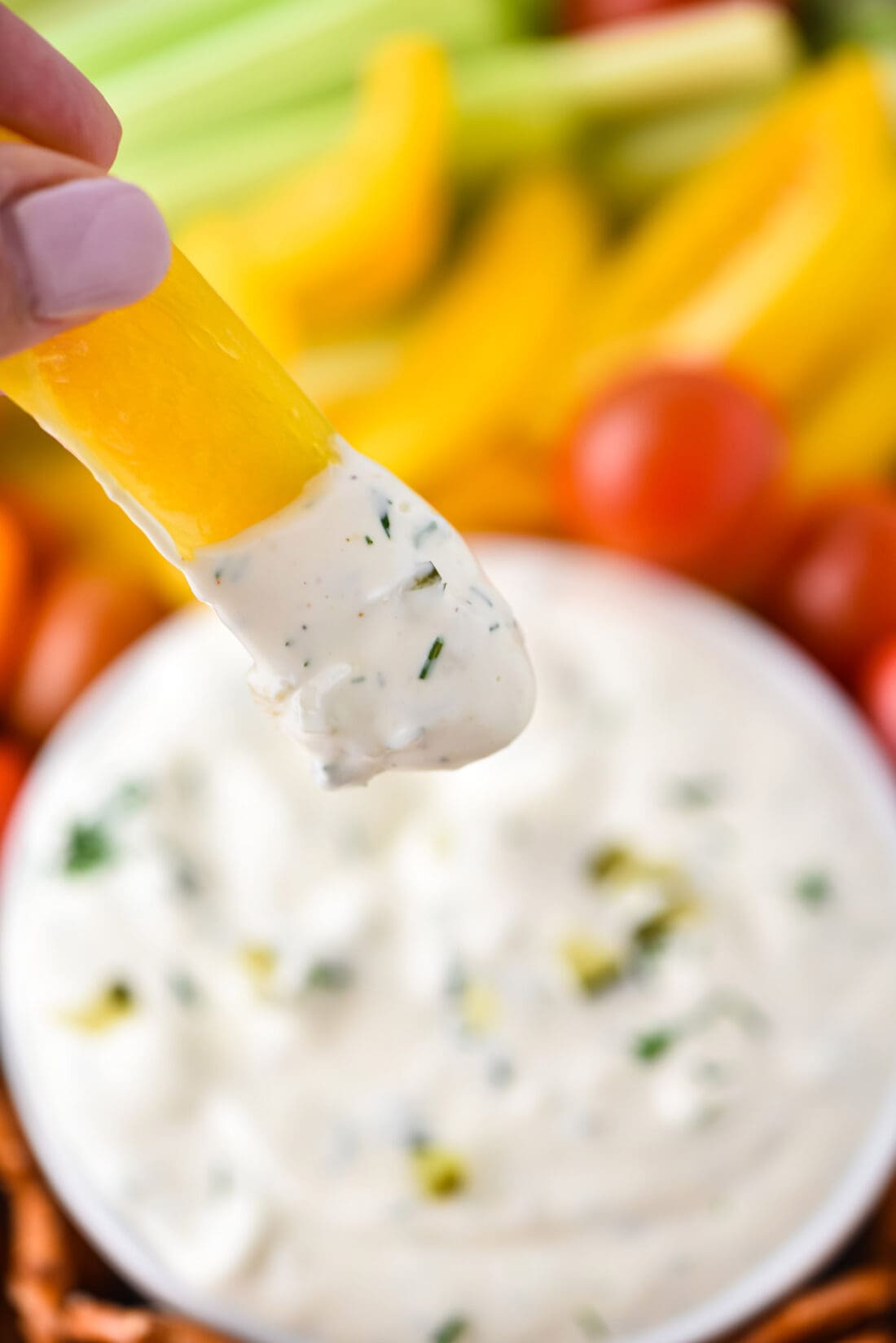 yellow bell pepper dipped in Dill Pickle Dip