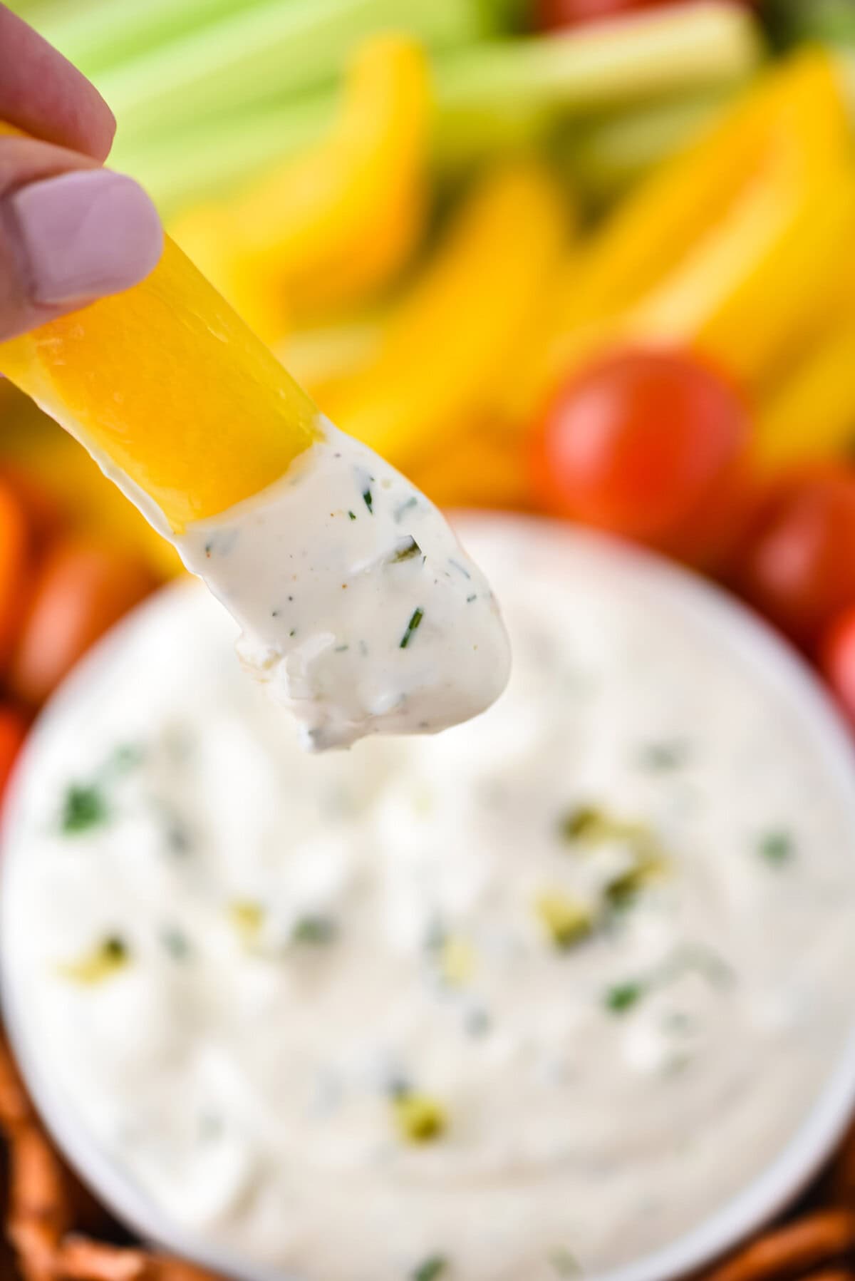 yellow bell pepper dipped in Dill Pickle Dip