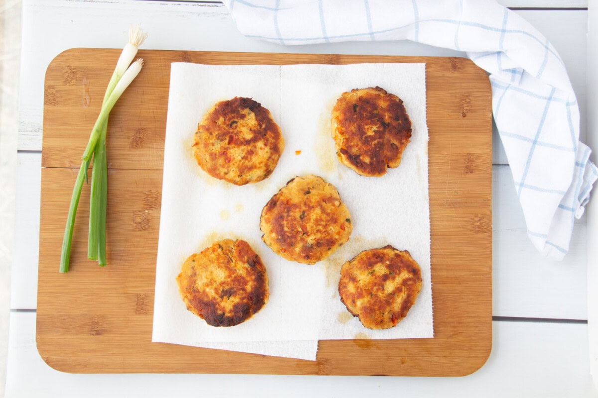 cooked fish cakes on a paper towel
