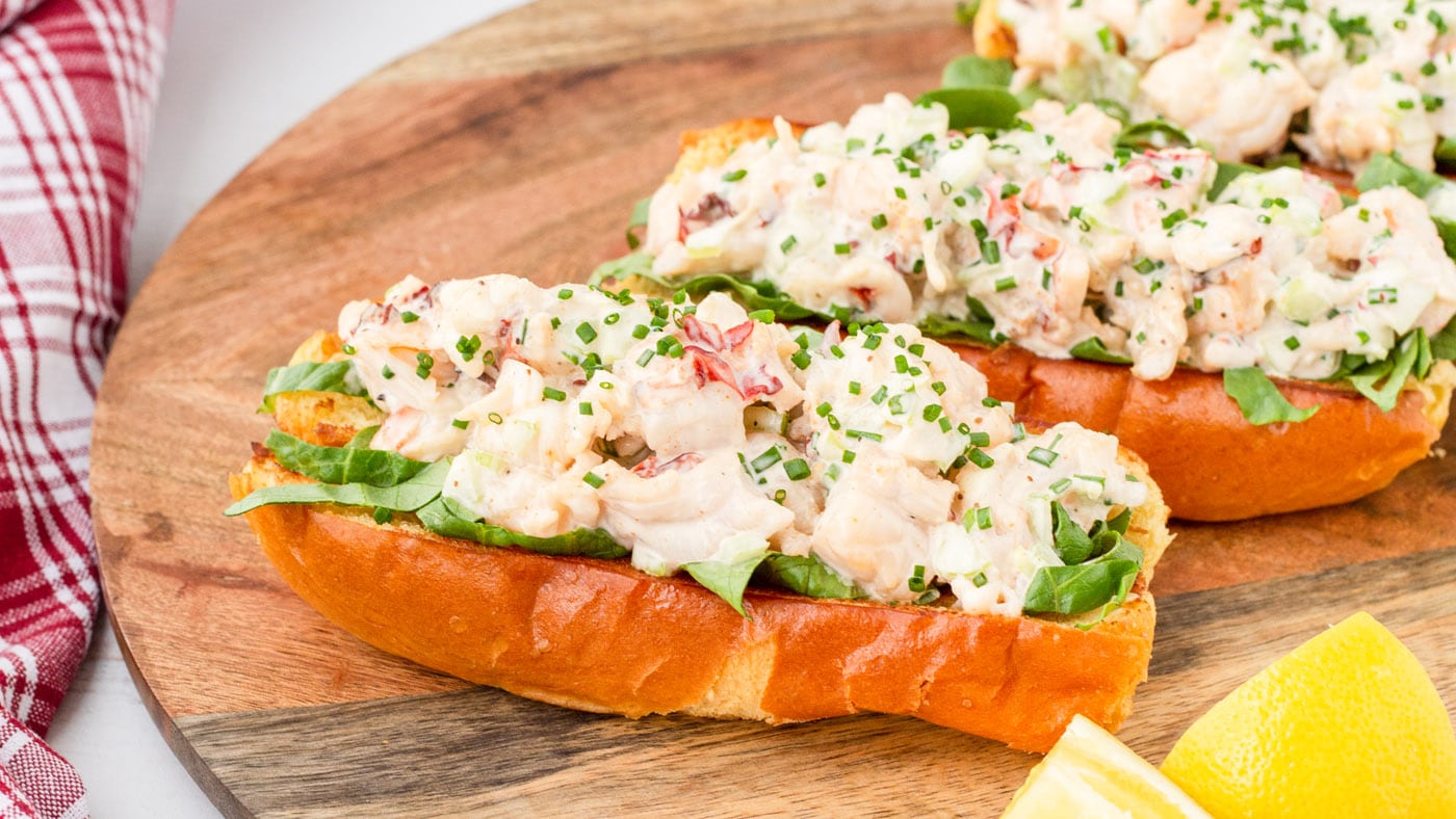 Simple yet flavorful ingredients make all the difference in a delicious lobster roll recipe. Pile on
