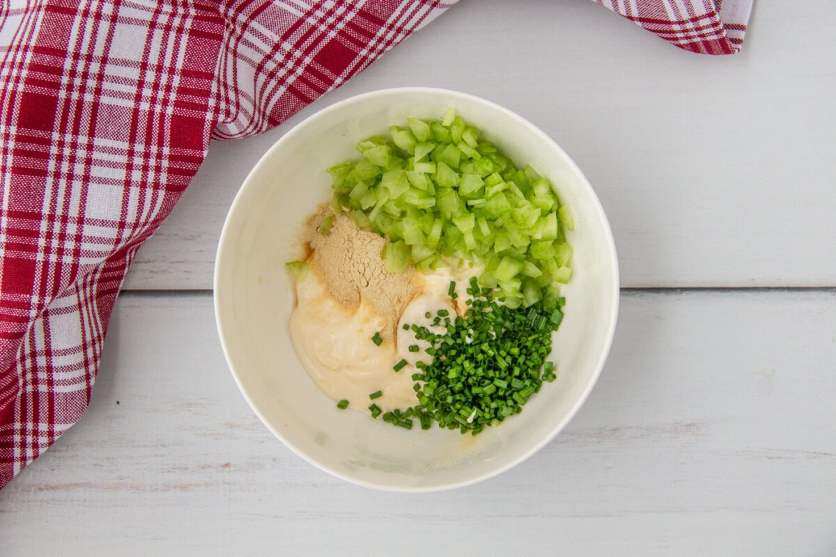 mayo lobster roll ingredients in a bowl