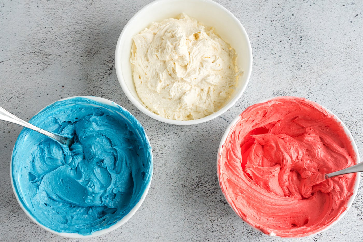 red, white, and blue buttercream frosting