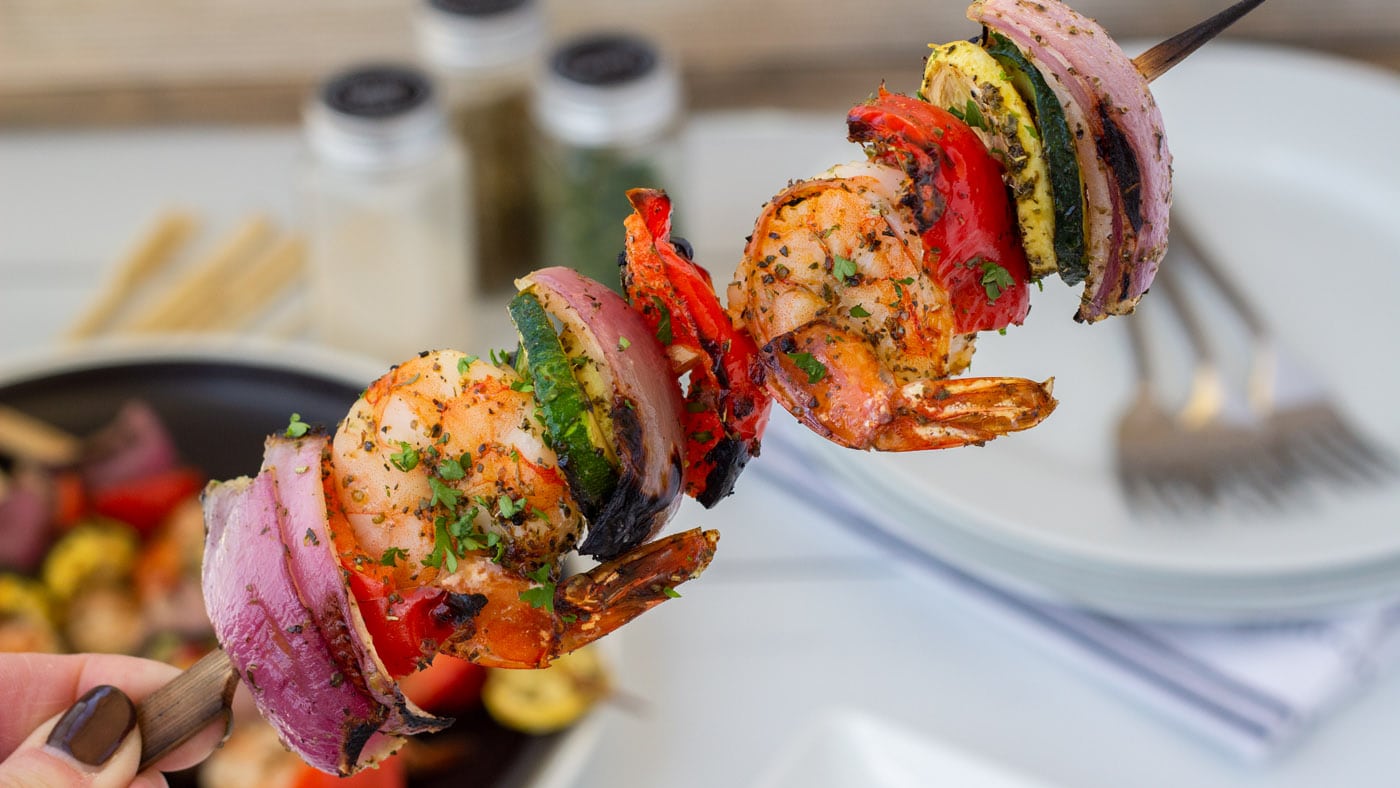 Plump shrimp and colorful fresh veggies skewed together and cooked on the grill to tender perfection