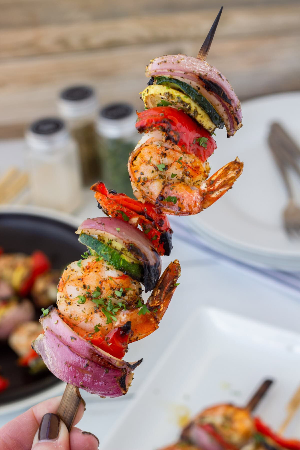 holding a Shrimp Kabob