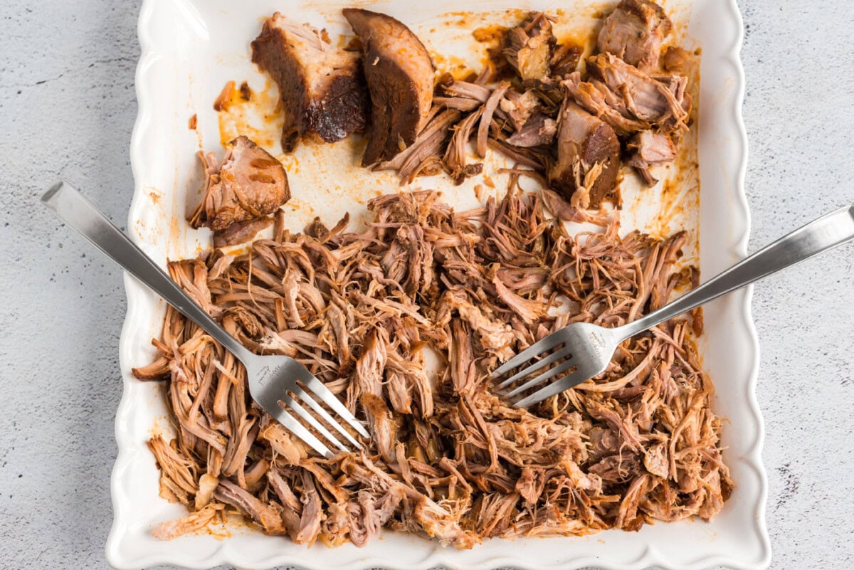 forks shredding pulled pork
