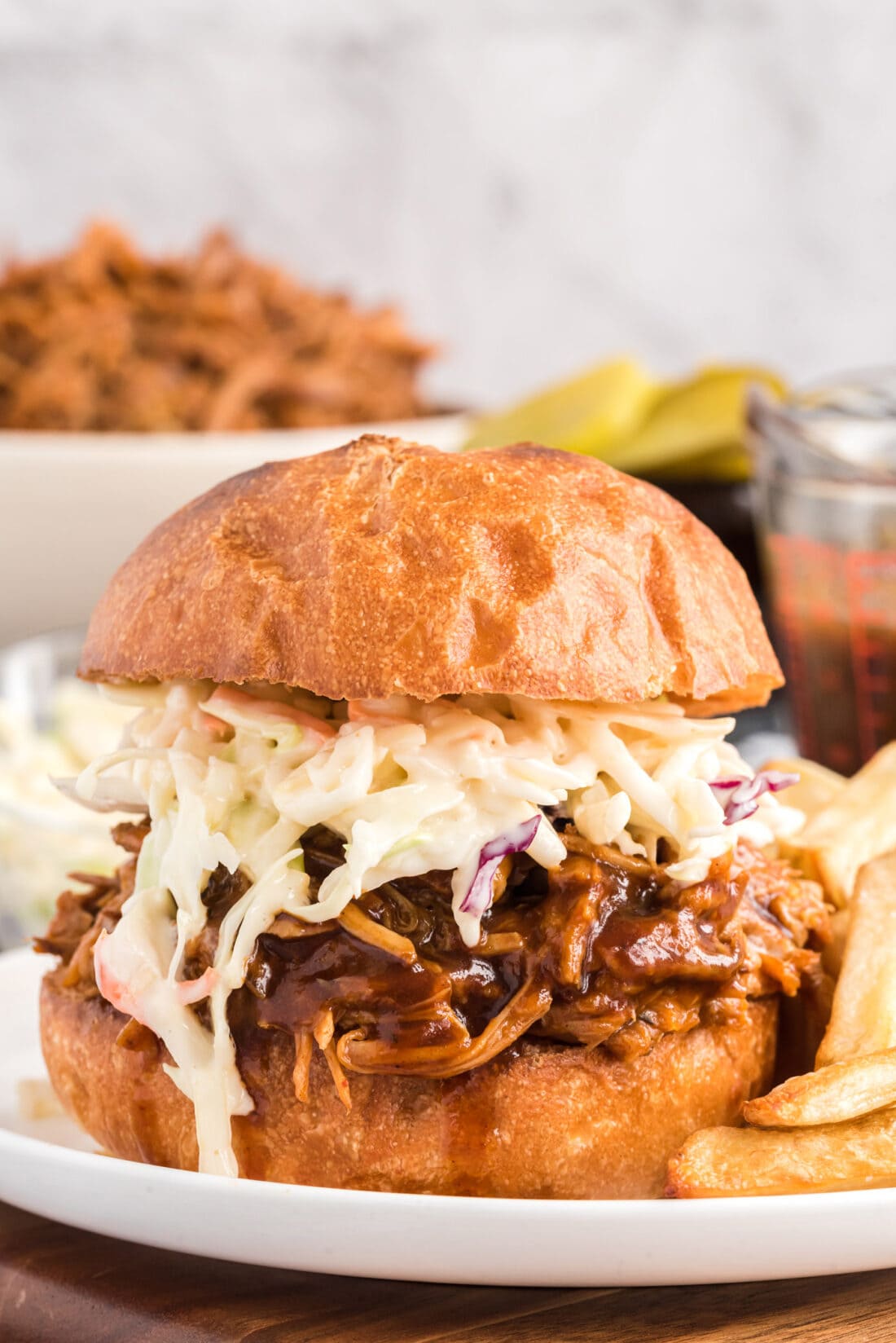 Slow Cooker Pulled Pork sandwich with coleslaw