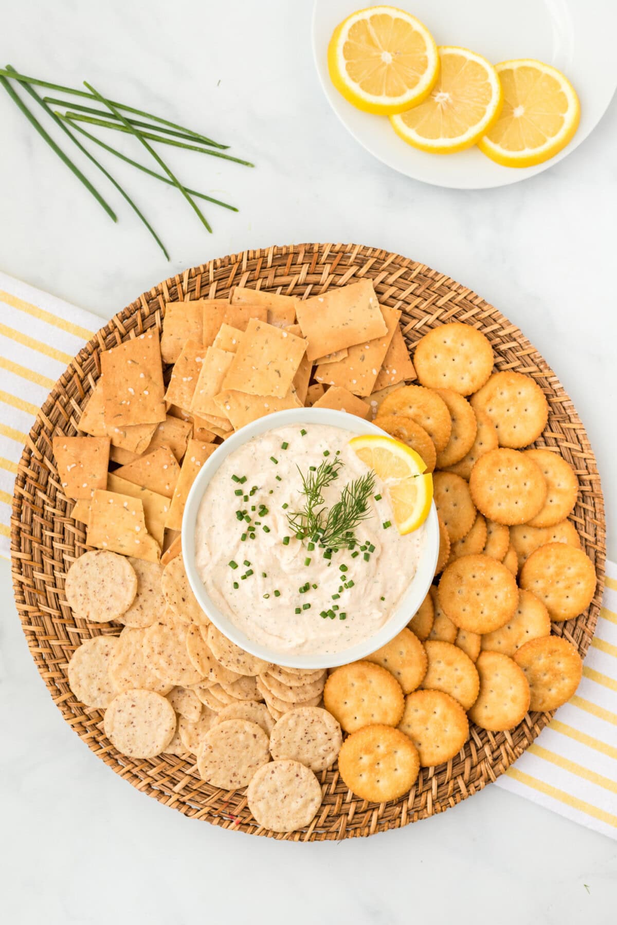 Smoked Salmon Dip in a bowl surrounded by crackers