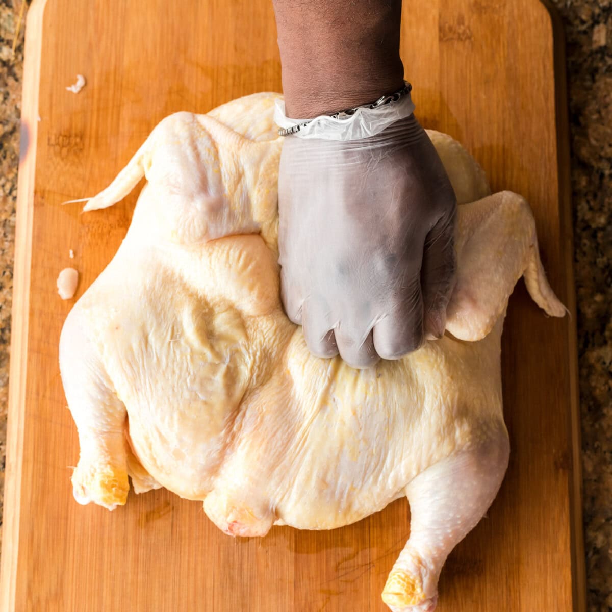 flattening spatchcock chicken