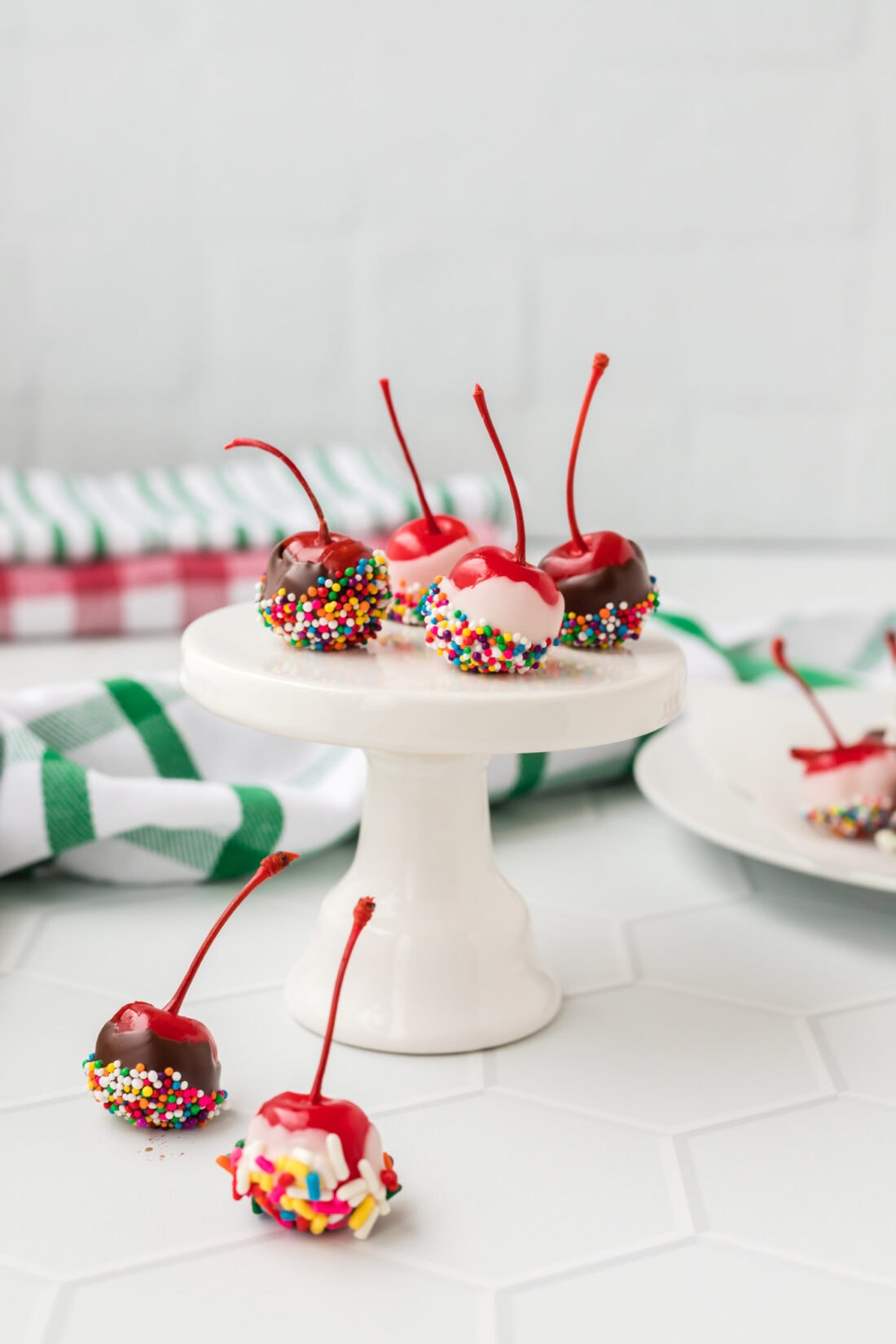 Spiked Cherries on a cupcake stand
