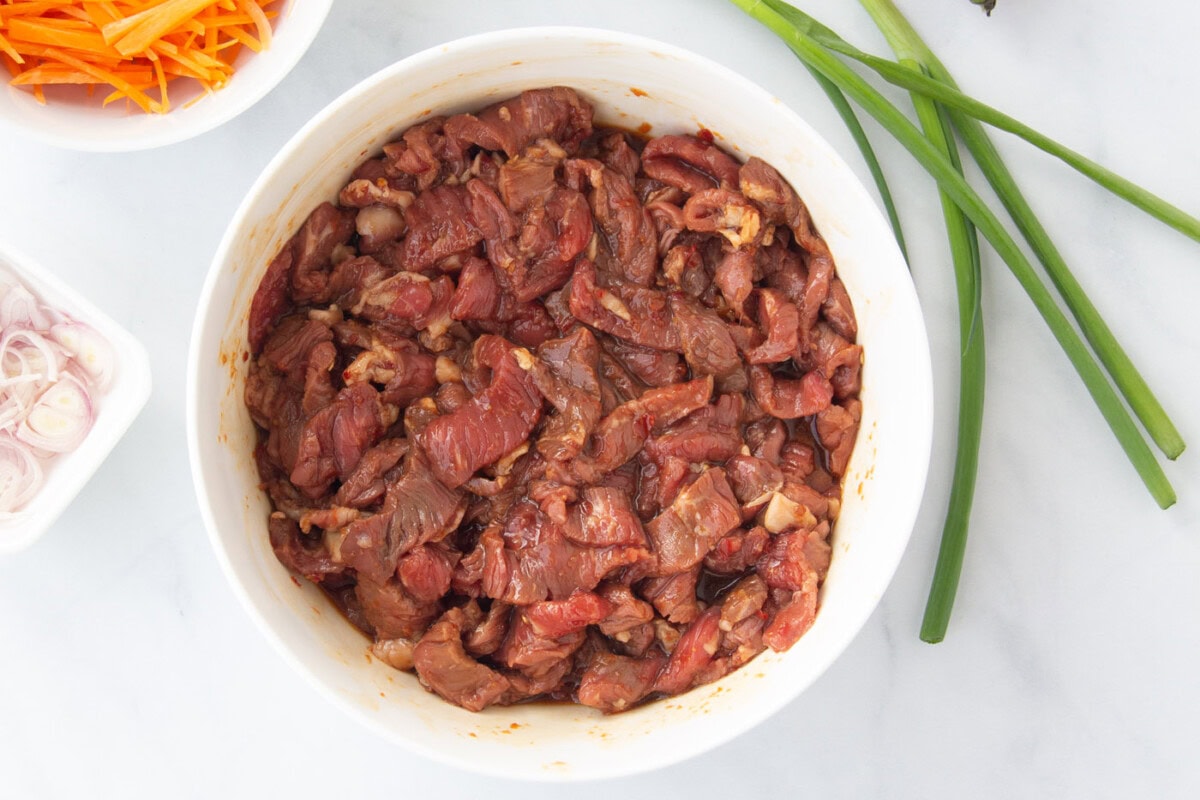 sliced sirloin steak in a bowl