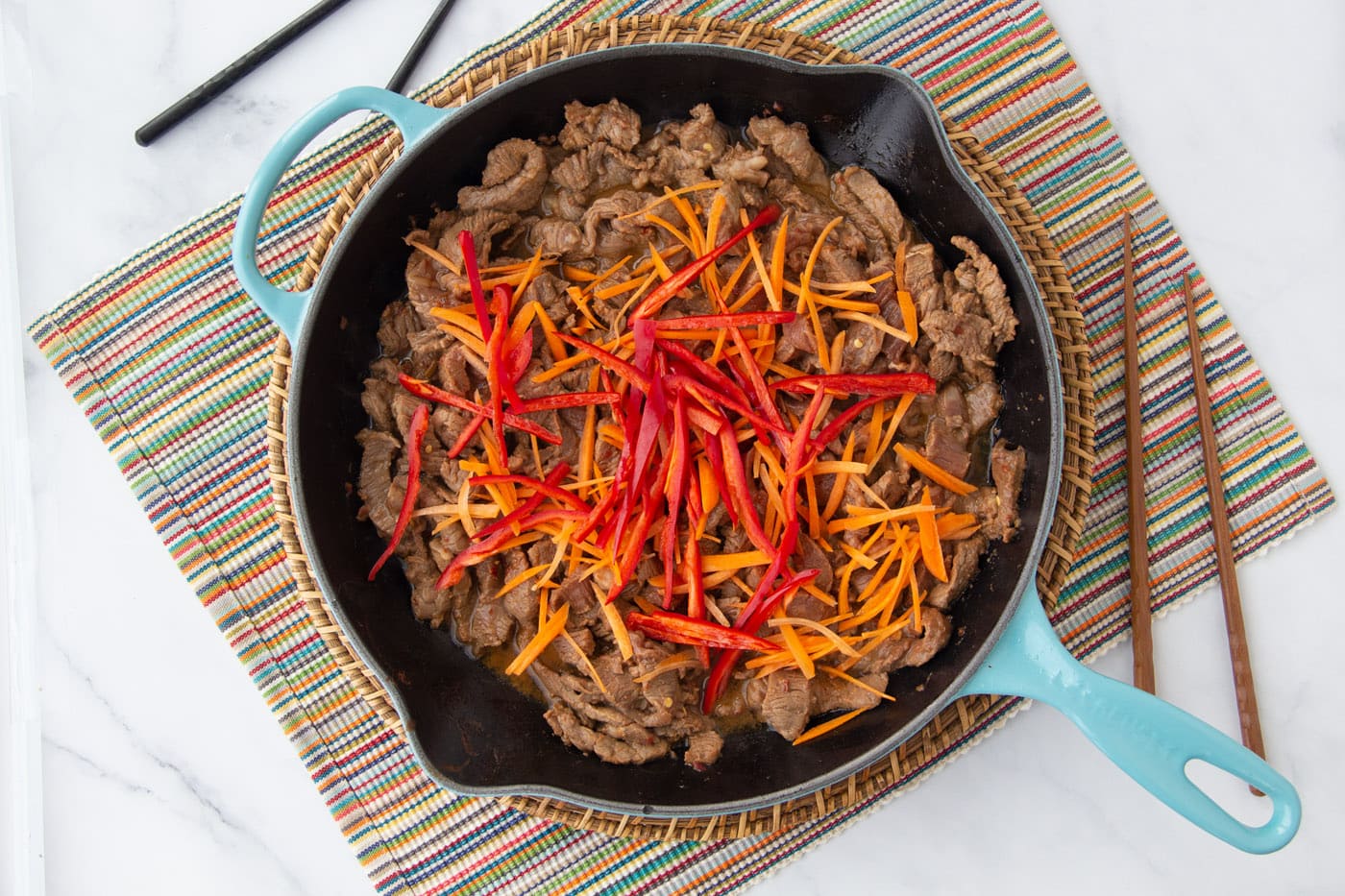 szechuan beef with veggies in a skillet