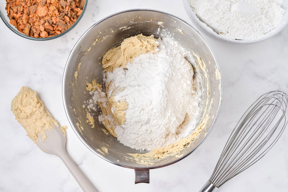 mixing flour into cookie dough