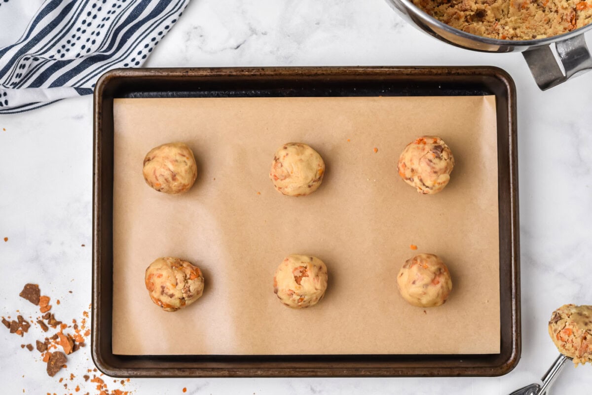 butterfinger cookies on a baking sheet