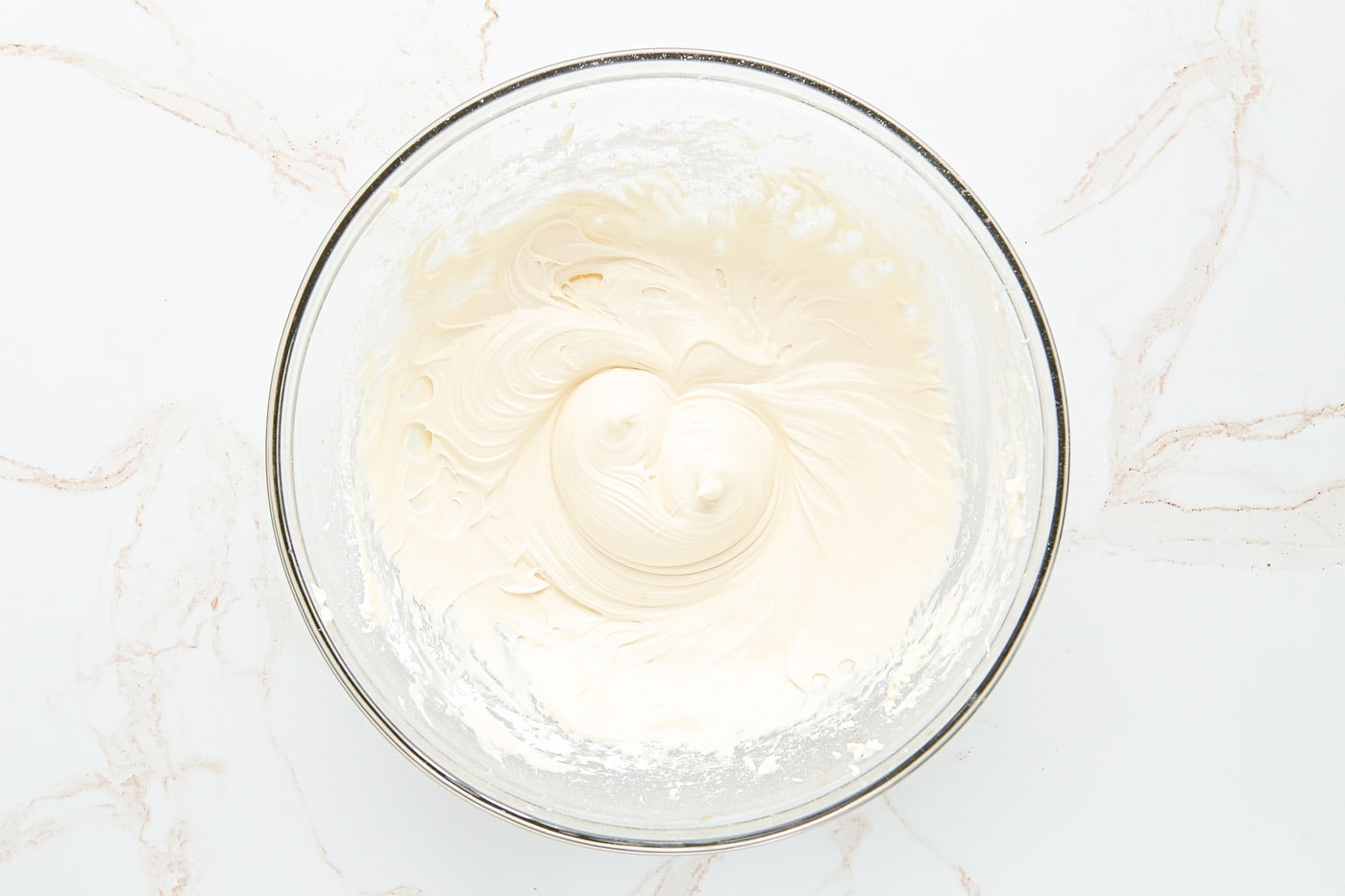 cream cheese beaten in a bowl