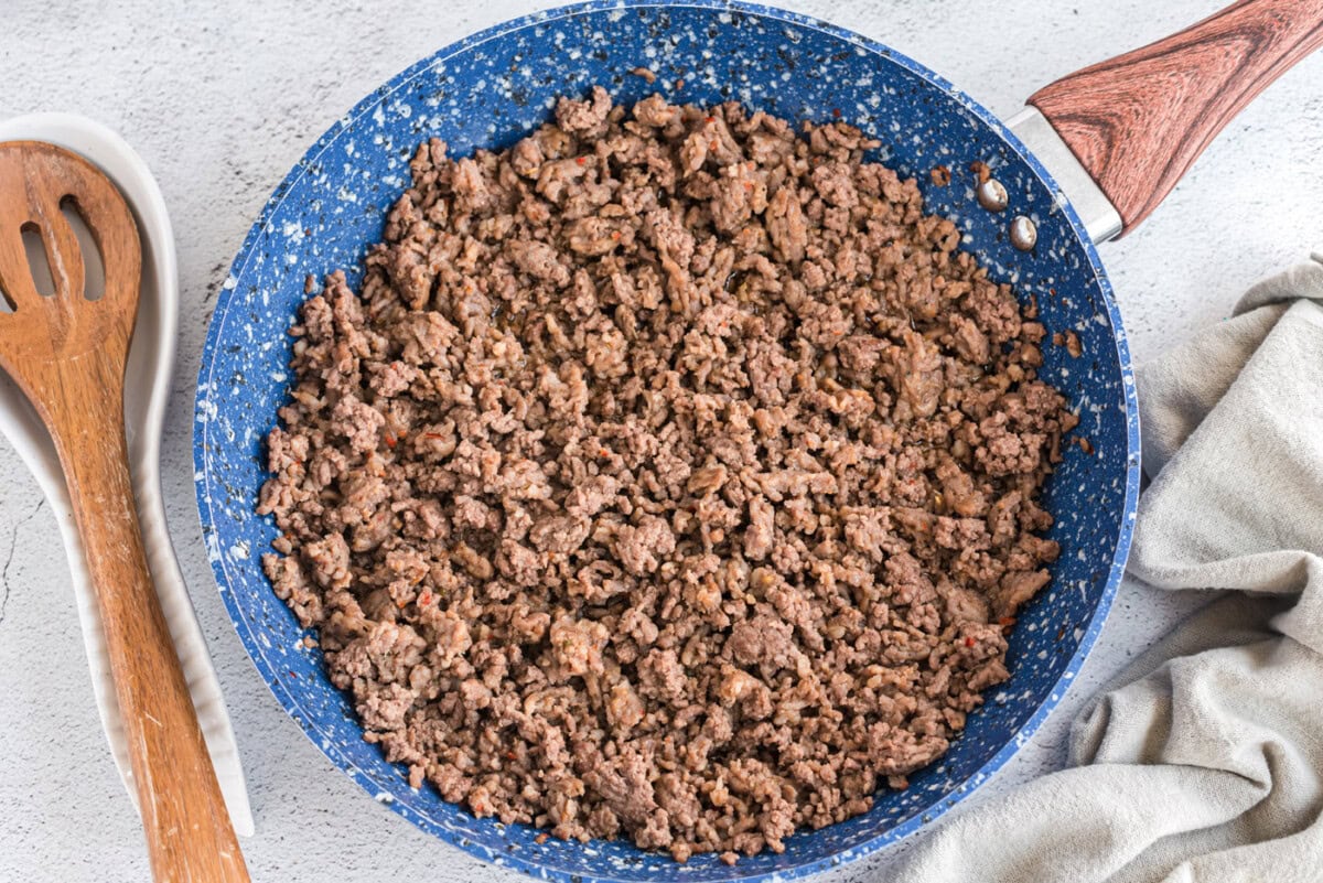 browned ground beef and sausage in a skillet