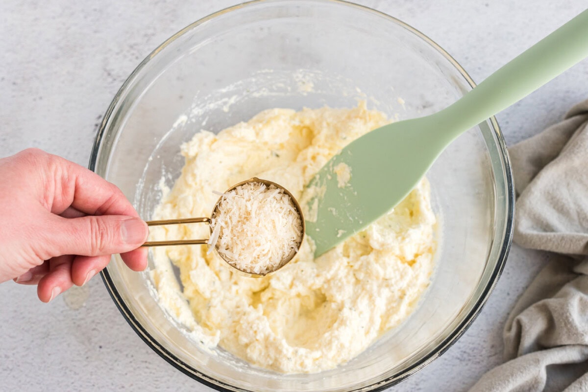 ricotta, mozzarella, parmesan mixed in a bowl