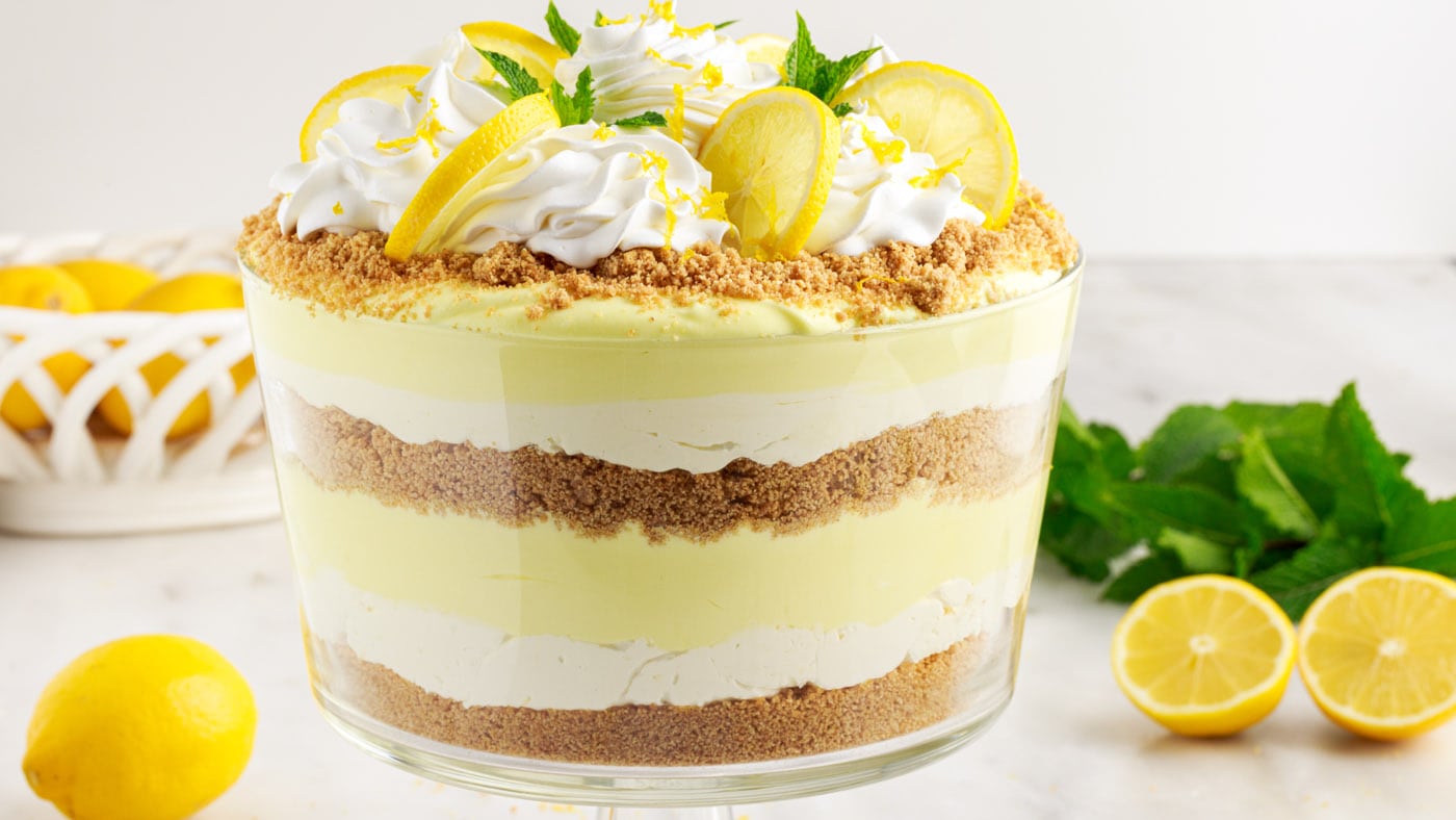 Lemon lush trifle is fluffy, light, and airy - perfect for summer potlucks and parties!