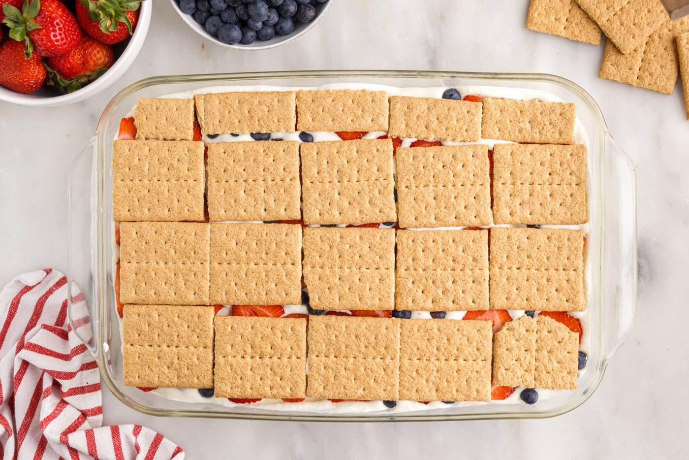 layer of graham crackers over fresh berries