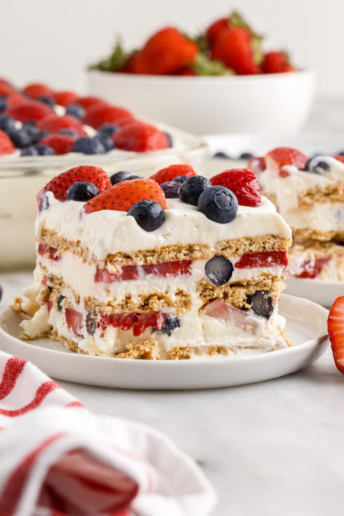 Slice of Mixed Berry Icebox Cake on a plate
