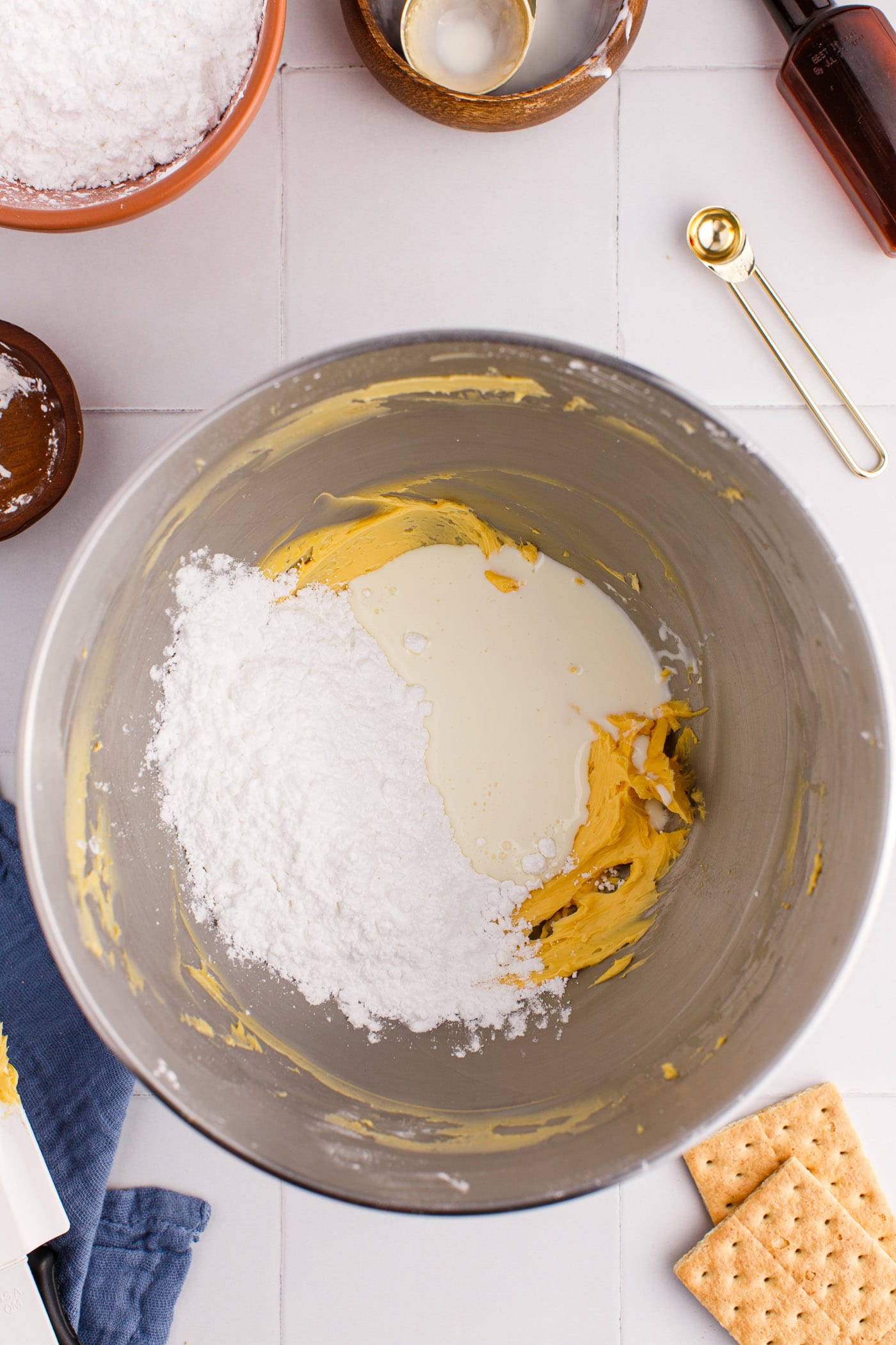 powdered sugar and custard powder in a mixing bowl