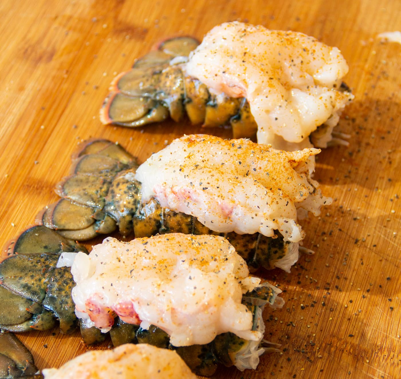 crowned lobster tail on cutting board