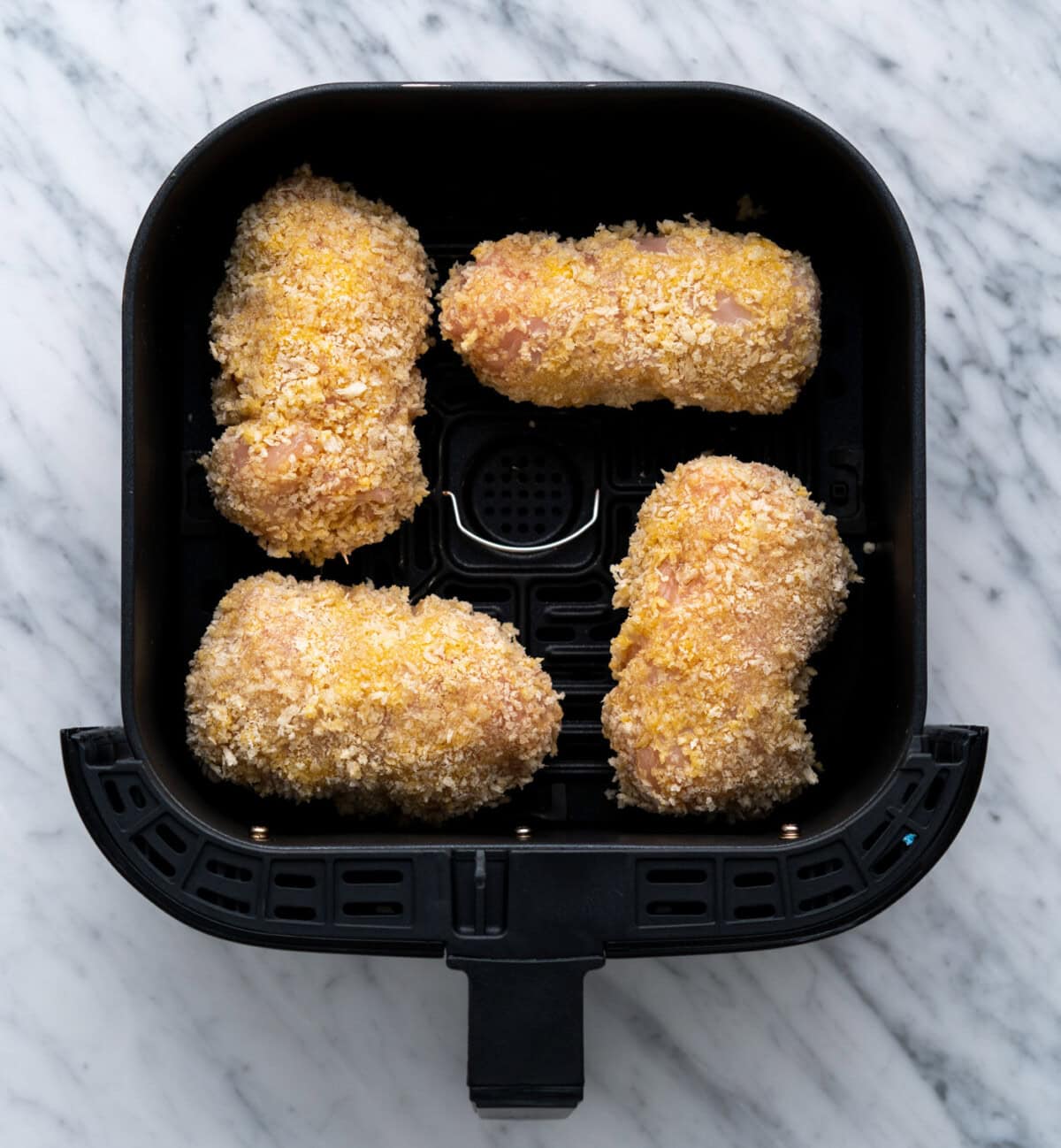 chicken cordon bleu in the air fryer basket
