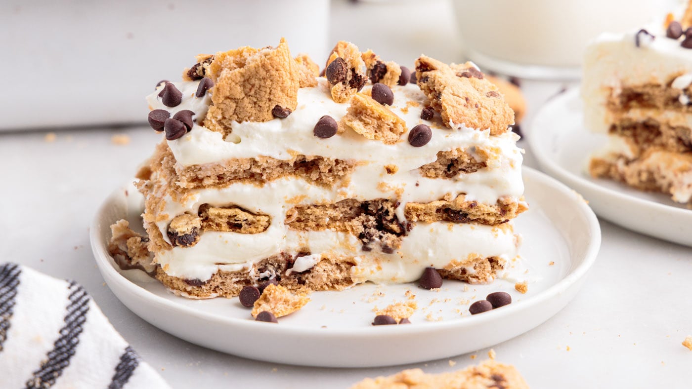 Crisp chocolate chip cookies mingle between layers of sweetened whipped cream cheese softening into 