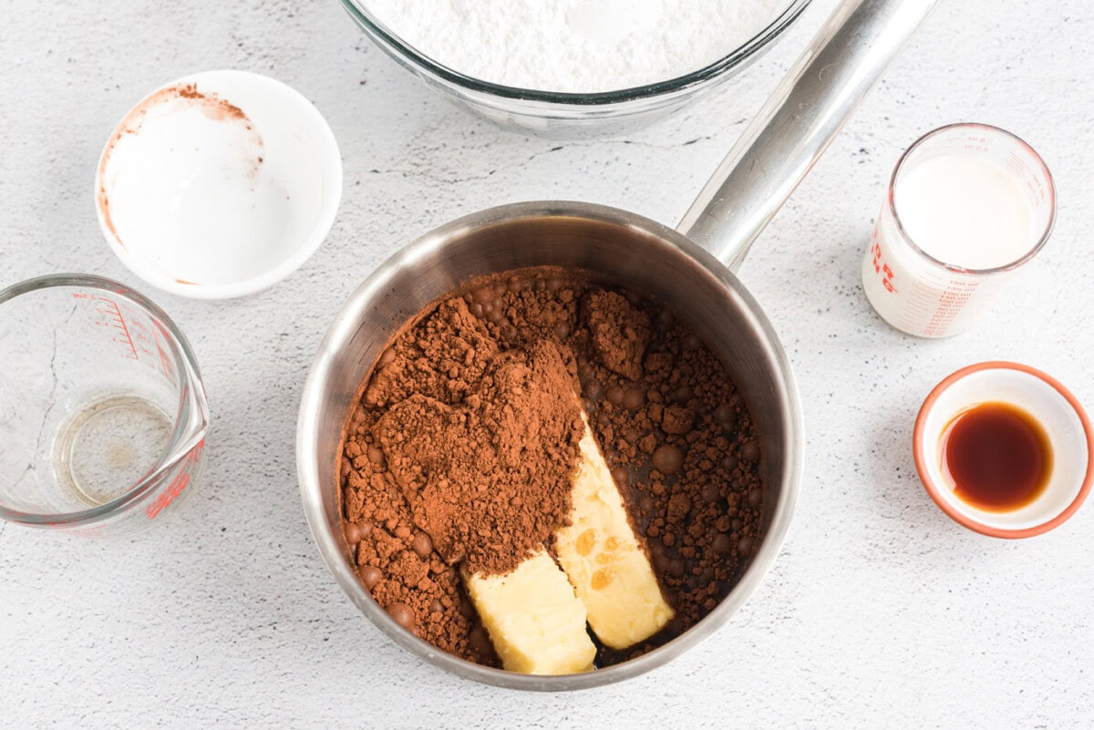 butter, coke, and cocoa in a saucepan