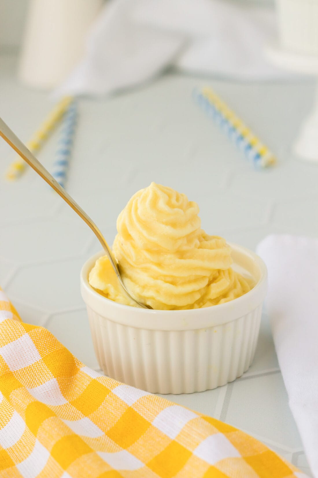 spoon in a dish of Dole Whip