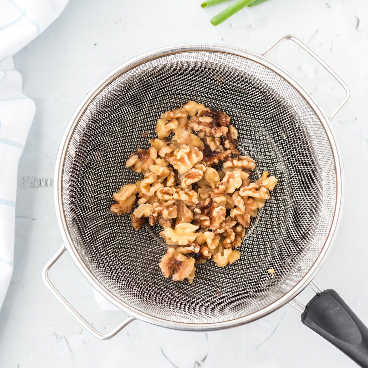 candied walnuts in a saucepan