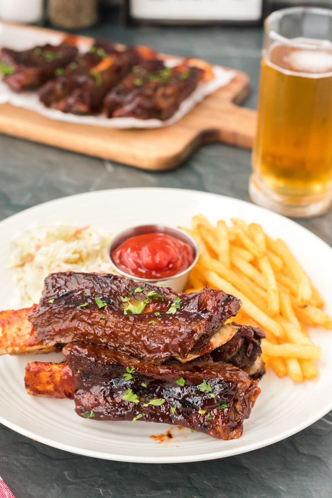 plate of Instant Pot Beef Ribs with fries